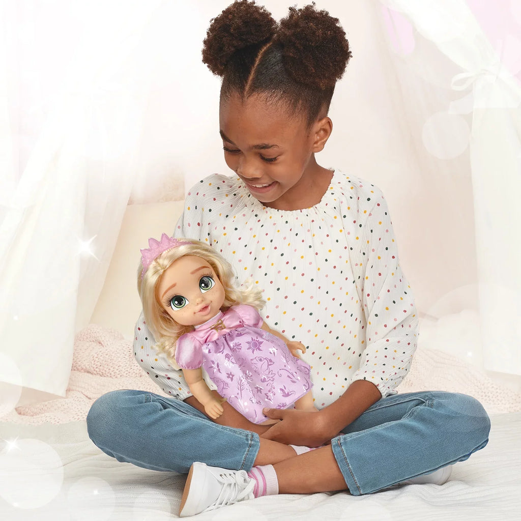 Disney Princess Deluxe 8 inch Rapunzel Baby Doll Includes Tiara and Bottle for Children Ages 2+