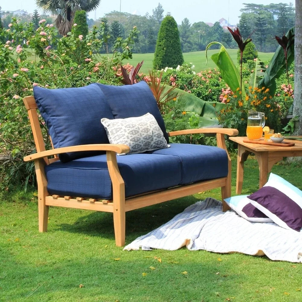 Cambridge Casual Leon Teak Patio Loveseat with Pillow Plantation Teak/Beige Pillow